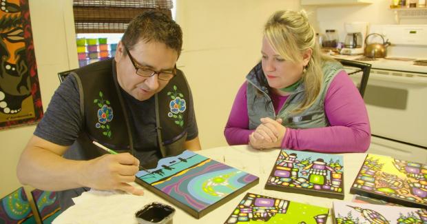 Brandy Yanchyk and artist John D Rombough