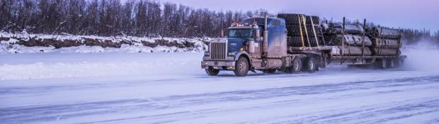 Truck travelling down ice road in the Northwest Territories 