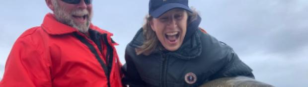 Anglers having fun with large catch 